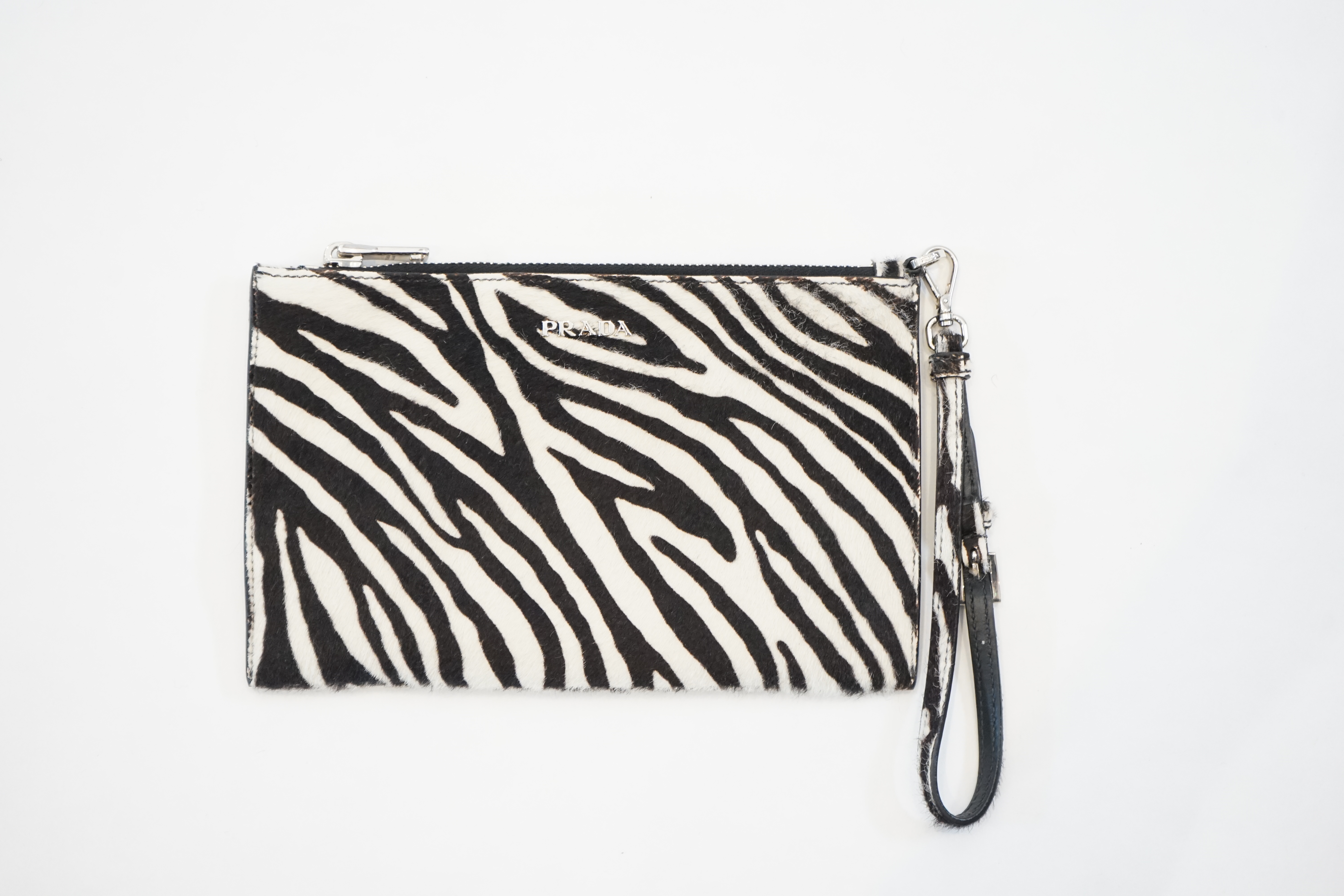 A Prada zebra print pony skin purse bag, width 21cm, height 13cm